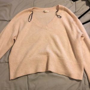 Pink sweater worn from H&M. Size Small